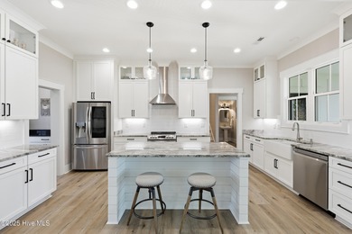 If you're looking for a showplace, this extraordinary custom on Magnolia Greens Golf Plantation in North Carolina - for sale on GolfHomes.com, golf home, golf lot