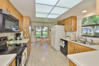 Welcome to this cozy and well-maintained Sunrise II model on Falcon Watch Golf Club in Florida - for sale on GolfHomes.com, golf home, golf lot
