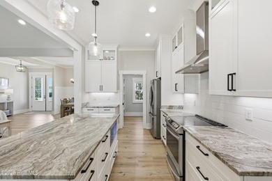 If you're looking for a showplace, this extraordinary custom on Magnolia Greens Golf Plantation in North Carolina - for sale on GolfHomes.com, golf home, golf lot