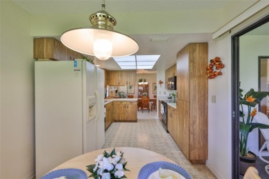 Welcome to this cozy and well-maintained Sunrise II model on Falcon Watch Golf Club in Florida - for sale on GolfHomes.com, golf home, golf lot