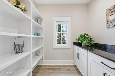 If you're looking for a showplace, this extraordinary custom on Magnolia Greens Golf Plantation in North Carolina - for sale on GolfHomes.com, golf home, golf lot