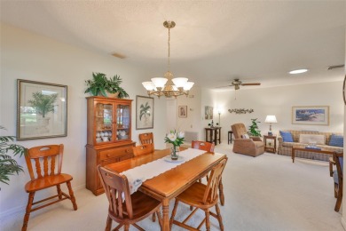 Welcome to this cozy and well-maintained Sunrise II model on Falcon Watch Golf Club in Florida - for sale on GolfHomes.com, golf home, golf lot