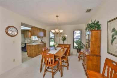 Welcome to this cozy and well-maintained Sunrise II model on Falcon Watch Golf Club in Florida - for sale on GolfHomes.com, golf home, golf lot