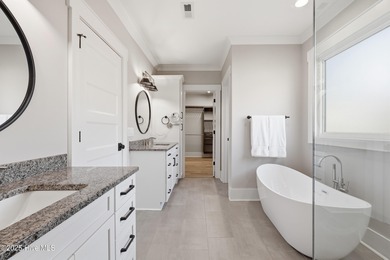 If you're looking for a showplace, this extraordinary custom on Magnolia Greens Golf Plantation in North Carolina - for sale on GolfHomes.com, golf home, golf lot