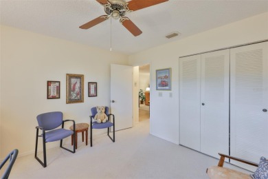 Welcome to this cozy and well-maintained Sunrise II model on Falcon Watch Golf Club in Florida - for sale on GolfHomes.com, golf home, golf lot