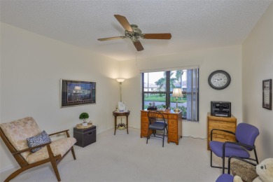Welcome to this cozy and well-maintained Sunrise II model on Falcon Watch Golf Club in Florida - for sale on GolfHomes.com, golf home, golf lot