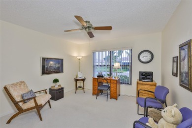 Welcome to this cozy and well-maintained Sunrise II model on Falcon Watch Golf Club in Florida - for sale on GolfHomes.com, golf home, golf lot