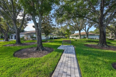 Welcome to this cozy and well-maintained Sunrise II model on Falcon Watch Golf Club in Florida - for sale on GolfHomes.com, golf home, golf lot