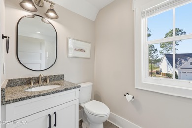 If you're looking for a showplace, this extraordinary custom on Magnolia Greens Golf Plantation in North Carolina - for sale on GolfHomes.com, golf home, golf lot