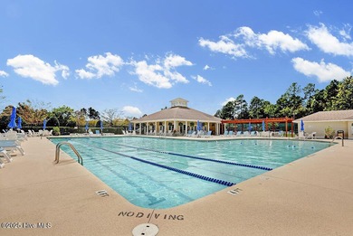 If you're looking for a showplace, this extraordinary custom on Magnolia Greens Golf Plantation in North Carolina - for sale on GolfHomes.com, golf home, golf lot
