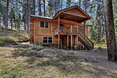 Below market value for quick sell! This charming log-sided cabin on Terrace Lakes Golf Resort in Idaho - for sale on GolfHomes.com, golf home, golf lot