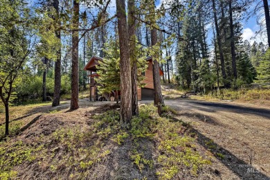 Below market value for quick sell! This charming log-sided cabin on Terrace Lakes Golf Resort in Idaho - for sale on GolfHomes.com, golf home, golf lot