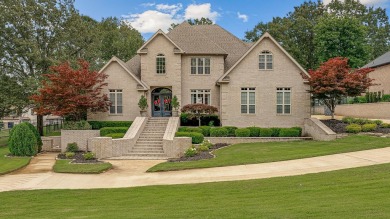 Step into timeless elegance with this expansive three-level home on RidgePointe Country Club in Arkansas - for sale on GolfHomes.com, golf home, golf lot