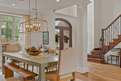 Step into timeless elegance with this expansive three-level home on RidgePointe Country Club in Arkansas - for sale on GolfHomes.com, golf home, golf lot