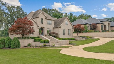 Step into timeless elegance with this expansive three-level home on RidgePointe Country Club in Arkansas - for sale on GolfHomes.com, golf home, golf lot