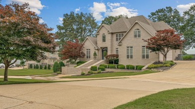 Step into timeless elegance with this expansive three-level home on RidgePointe Country Club in Arkansas - for sale on GolfHomes.com, golf home, golf lot