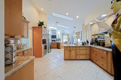 Discover luxury living in the heart of PGA National's on PGA National Golf Club in Florida - for sale on GolfHomes.com, golf home, golf lot