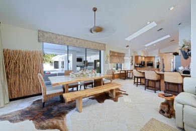 Discover luxury living in the heart of PGA National's on PGA National Golf Club in Florida - for sale on GolfHomes.com, golf home, golf lot