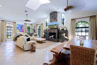 Discover luxury living in the heart of PGA National's on  in Florida - for sale on GolfHomes.com, golf home, golf lot