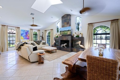 Discover luxury living in the heart of PGA National's on PGA National Golf Club in Florida - for sale on GolfHomes.com, golf home, golf lot