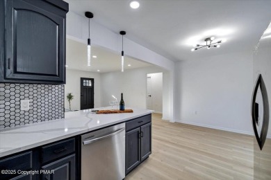 MOVE RIGHT IN to this Stylish Contemporary RANCH! Located in on Pocono Farms Country Club in Pennsylvania - for sale on GolfHomes.com, golf home, golf lot