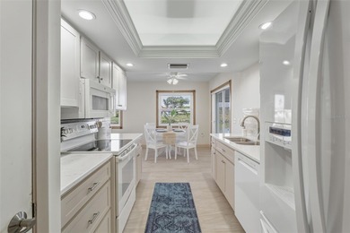 This ADORABLE and meticulously maintained residence is located on Jacaranda West Country Club in Florida - for sale on GolfHomes.com, golf home, golf lot