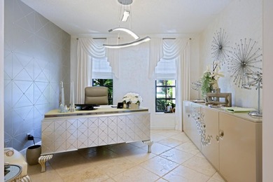 Discover luxury living in the heart of PGA National's on  in Florida - for sale on GolfHomes.com, golf home, golf lot