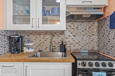 Wake Up to the Waves -- Fully Renovated 1BR Oceanfront Escape at on Midway Par-3 in South Carolina - for sale on GolfHomes.com, golf home, golf lot