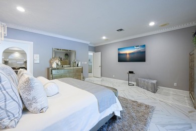 Discover luxury living in the heart of PGA National's on  in Florida - for sale on GolfHomes.com, golf home, golf lot