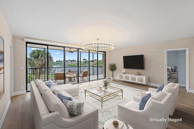 Beautiful waterfront condo in the gated community of Jonathan's on Jonathans Landing Golf Club in Florida - for sale on GolfHomes.com, golf home, golf lot