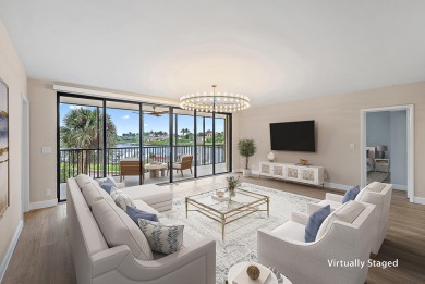 Beautifully updated waterfront condo in the gated community of on Jonathans Landing Golf Club in Florida - for sale on GolfHomes.com, golf home, golf lot