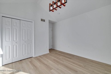 MOVE RIGHT IN to this Stylish Contemporary RANCH! Located in on Pocono Farms Country Club in Pennsylvania - for sale on GolfHomes.com, golf home, golf lot