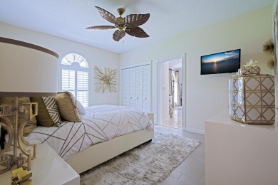Discover luxury living in the heart of PGA National's on PGA National Golf Club in Florida - for sale on GolfHomes.com, golf home, golf lot