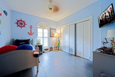 Discover luxury living in the heart of PGA National's on PGA National Golf Club in Florida - for sale on GolfHomes.com, golf home, golf lot