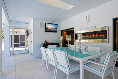 Discover luxury living in the heart of PGA National's on PGA National Golf Club in Florida - for sale on GolfHomes.com, golf home, golf lot