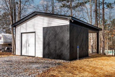 28-Acre Double Lot for Sale with a Meticulously Designed Tiny on River Golf and Country Club at Lake Royale in North Carolina - for sale on GolfHomes.com, golf home, golf lot