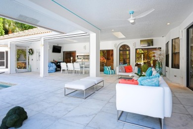 Discover luxury living in the heart of PGA National's on PGA National Golf Club in Florida - for sale on GolfHomes.com, golf home, golf lot