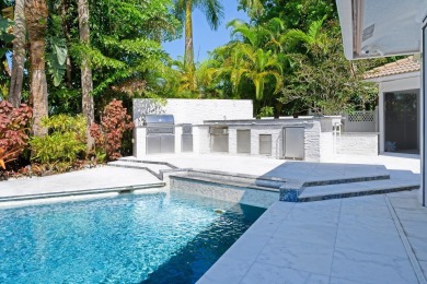 Discover luxury living in the heart of PGA National's on PGA National Golf Club in Florida - for sale on GolfHomes.com, golf home, golf lot