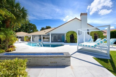 Discover luxury living in the heart of PGA National's on PGA National Golf Club in Florida - for sale on GolfHomes.com, golf home, golf lot