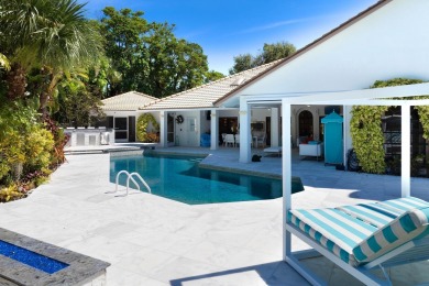 Discover luxury living in the heart of PGA National's on PGA National Golf Club in Florida - for sale on GolfHomes.com, golf home, golf lot