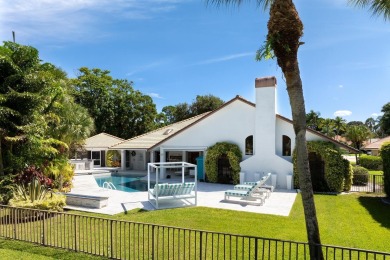 Discover luxury living in the heart of PGA National's on PGA National Golf Club in Florida - for sale on GolfHomes.com, golf home, golf lot