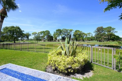 Discover luxury living in the heart of PGA National's on PGA National Golf Club in Florida - for sale on GolfHomes.com, golf home, golf lot