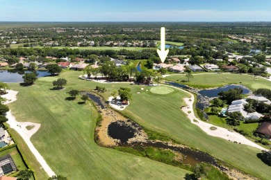 Discover luxury living in the heart of PGA National's on PGA National Golf Club in Florida - for sale on GolfHomes.com, golf home, golf lot