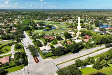 Discover luxury living in the heart of PGA National's on PGA National Golf Club in Florida - for sale on GolfHomes.com, golf home, golf lot