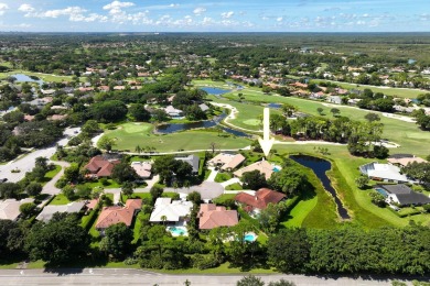 Discover luxury living in the heart of PGA National's on PGA National Golf Club in Florida - for sale on GolfHomes.com, golf home, golf lot