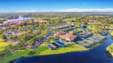 Discover luxury living in the heart of PGA National's on PGA National Golf Club in Florida - for sale on GolfHomes.com, golf home, golf lot