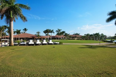 Discover luxury living in the heart of PGA National's on PGA National Golf Club in Florida - for sale on GolfHomes.com, golf home, golf lot