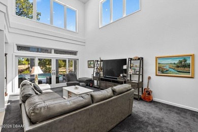 Stunning contemporary architecture frames the wide open interior on Plantation Bay Golf and Country Club in Florida - for sale on GolfHomes.com, golf home, golf lot