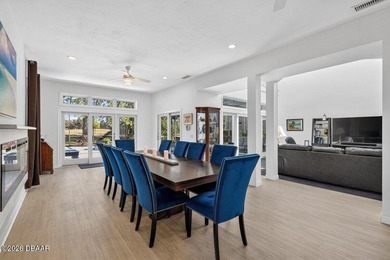 Stunning contemporary architecture frames the wide open interior on Plantation Bay Golf and Country Club in Florida - for sale on GolfHomes.com, golf home, golf lot