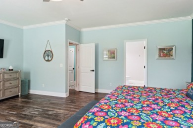 Imagine retreating to your spacious master suite on the main on Black Creek Golf Club in Georgia - for sale on GolfHomes.com, golf home, golf lot